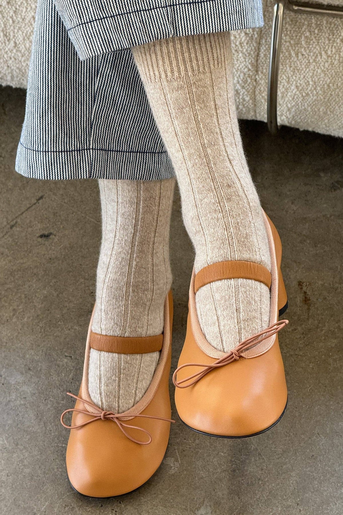Le Bon Shoppe classic cashmere socks in neutral color, soft knit fabric, close-up of cozy, stylish winter footwear.