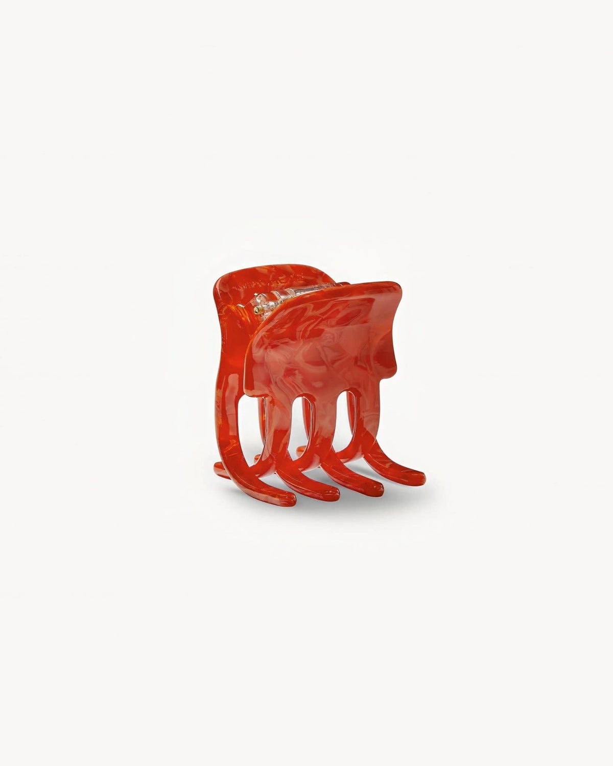 Mini Claw in Poppy by MACHETE, a small decorative claw tool with vibrant red-orange poppy color, shown on a white background.