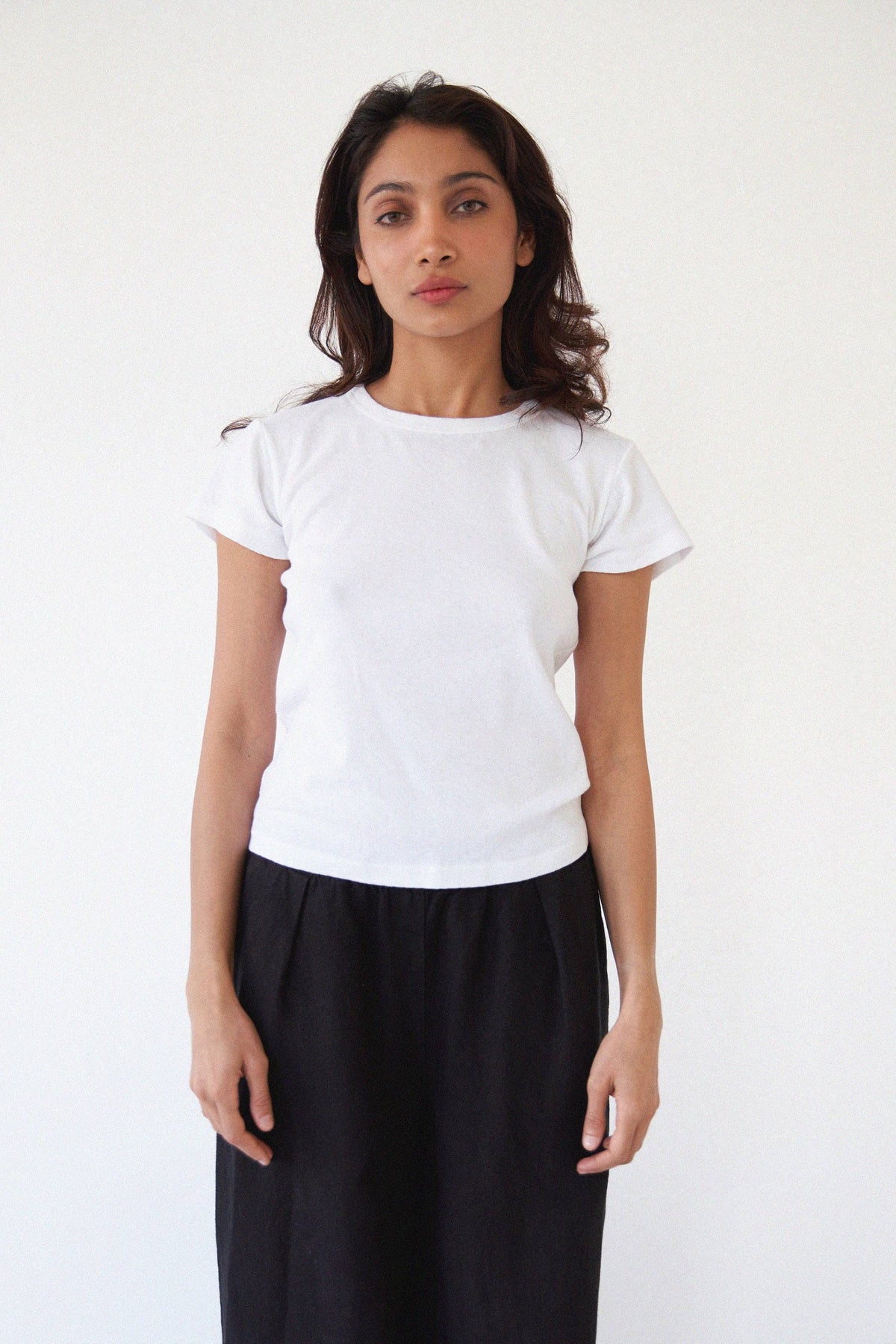 Pointelle baby tee by LA RELAXED featuring delicate knit fabric and short sleeves, perfect for comfortable, stylish babywear.