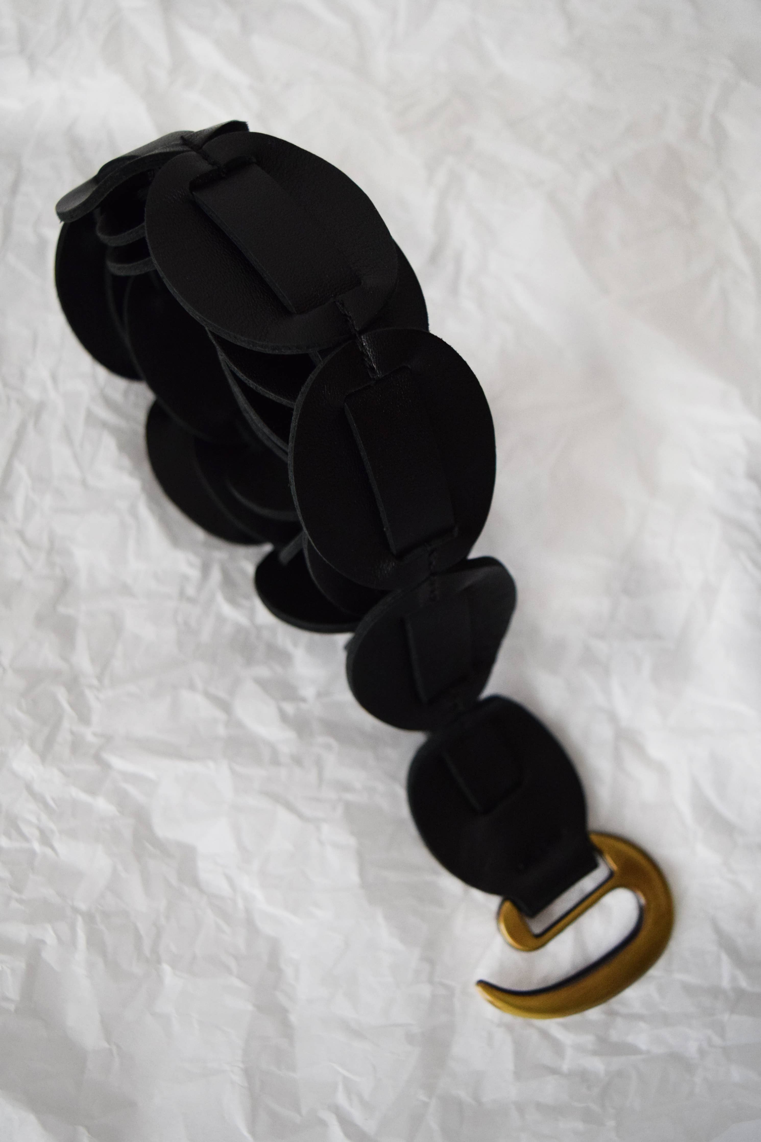 Black Shishi Wrap Belt by ADA Collection Belts, adjustable woven statement accessory for stylish outfits.