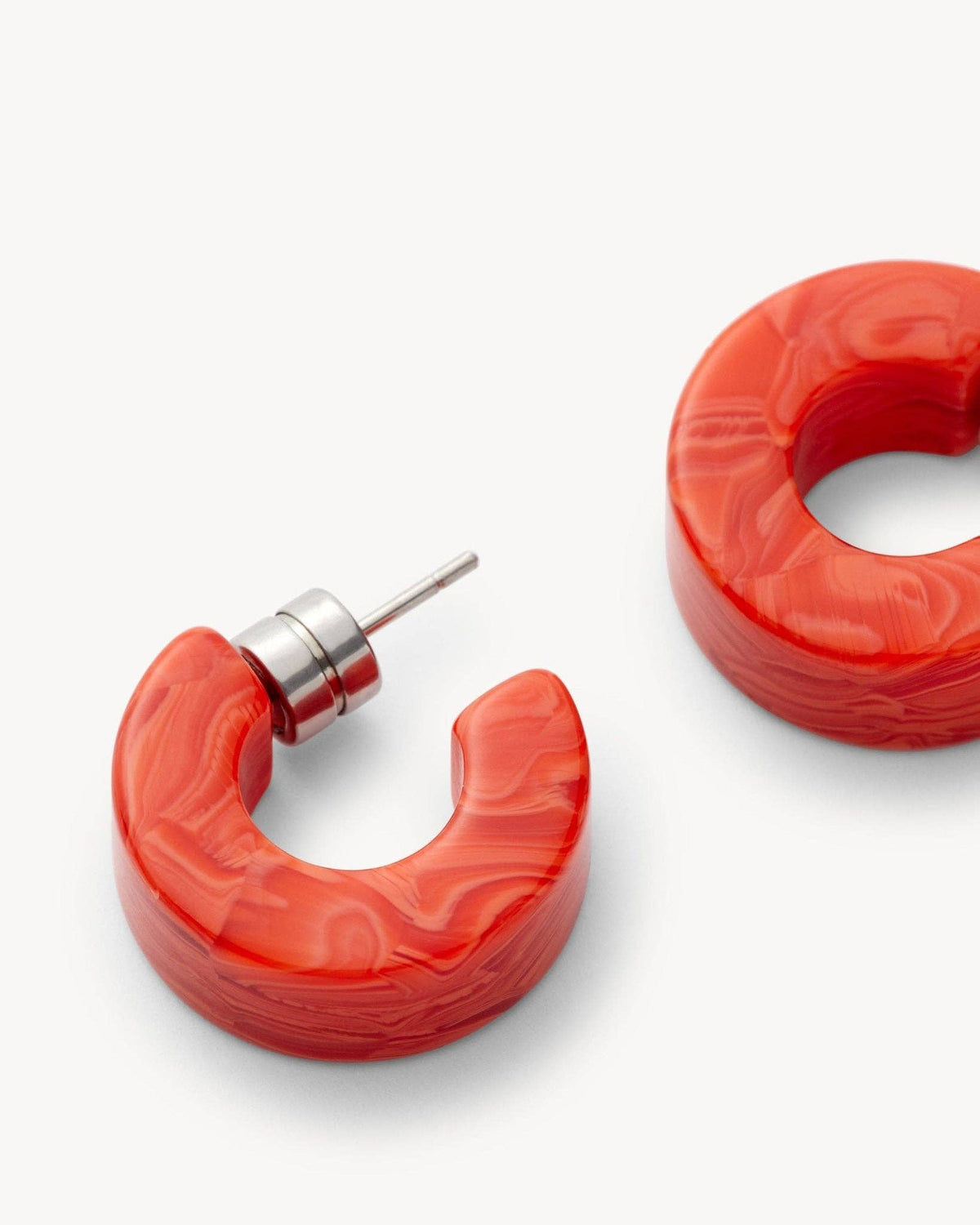 MACHETE Muse Hoops in Poppy, vibrant red-orange statement earrings with a circular hoop design and shiny finish.