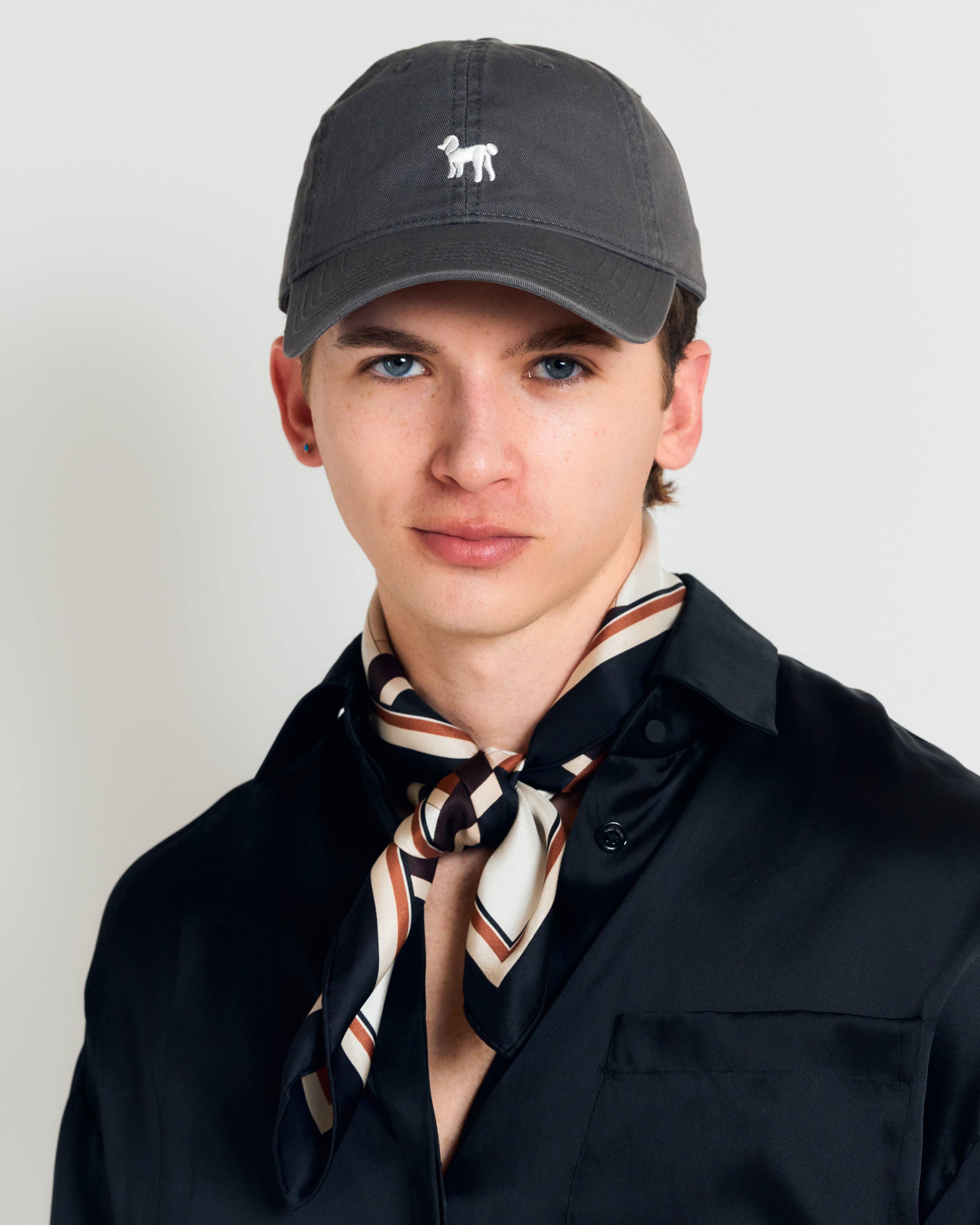 Lost Pattern NYC Silk Square Scarf in neutral tones with a stylish pattern, featuring soft silk fabric and versatile design.