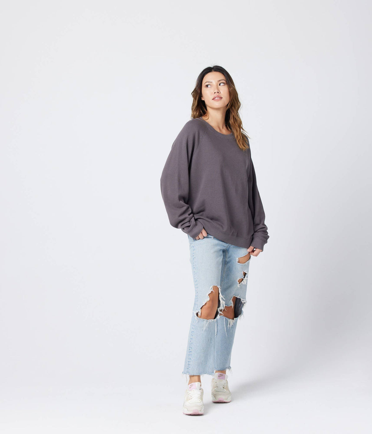 Organic cotton raglan fleece sweatshirt from Known Supply, shown in a cozy, casual fit with contrasting sleeves.