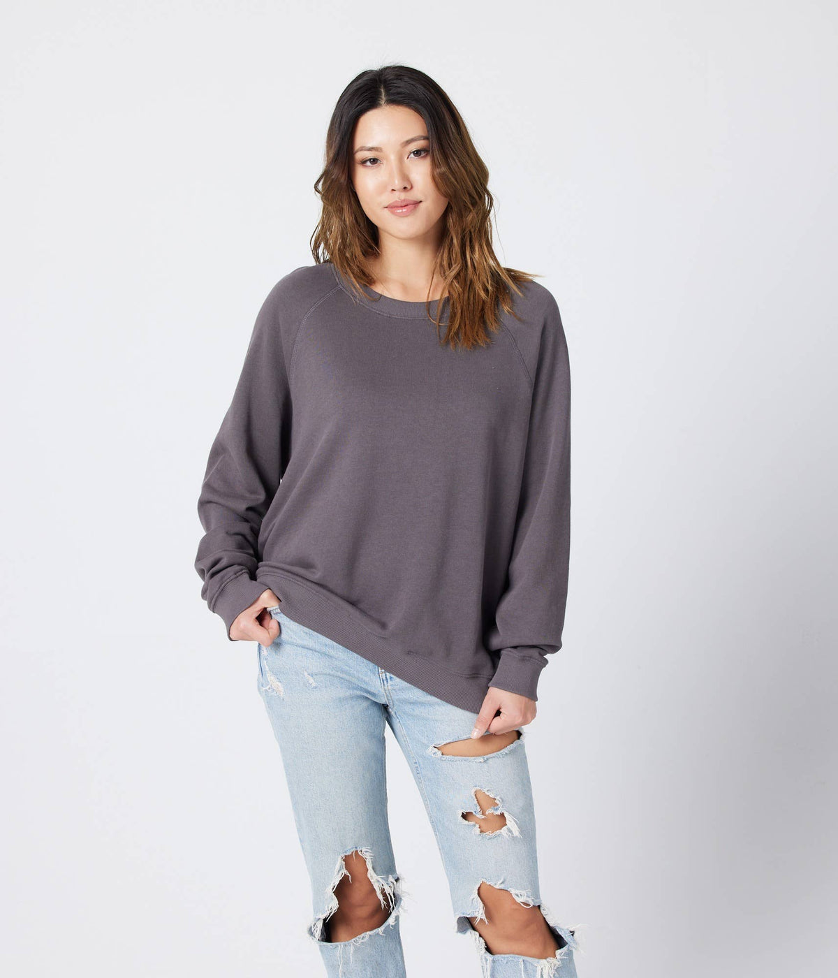 Organic cotton Raglan fleece sweatshirt by Known Supply, showing a cozy, casual long-sleeve top with a relaxed fit.