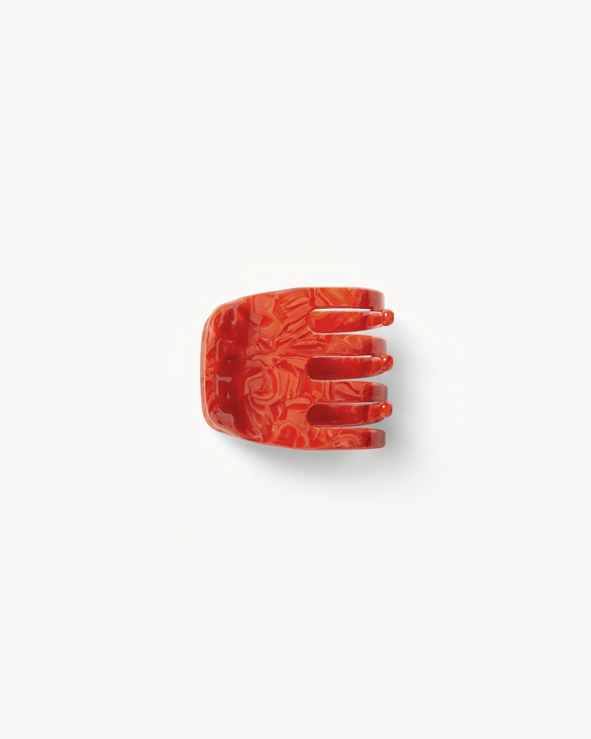 Mini Claw in Poppy by MACHETE featuring a vibrant red plastic claw with detailed design and small size.