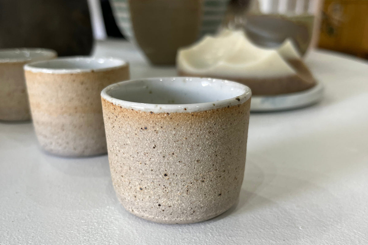 Handmade speckled ceramic match striker from Sage Valley, designed for candle votives, crafted in New Mexico.