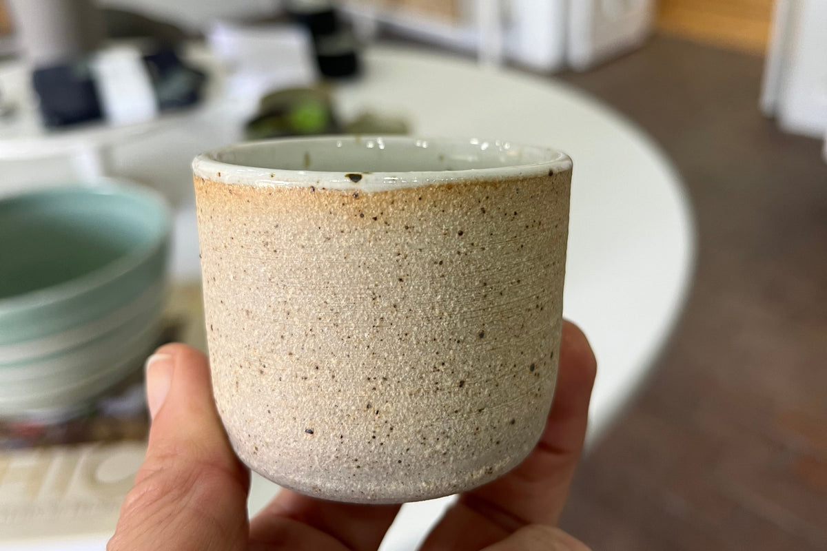Handmade speckled ceramic match striker from Sage Valley, designed for candle votives, crafted in New Mexico.