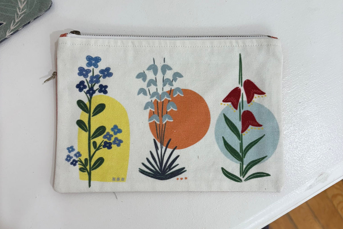 Jen Fox Studio crane and desert botanical canvas zip pouch, compact accessories bag with vibrant floral and bird design.