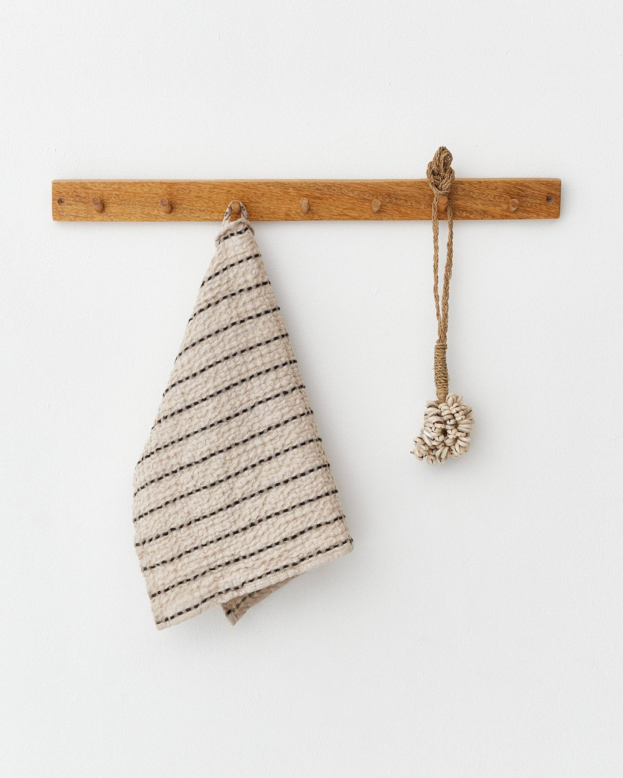Waffle face towel in Stripes