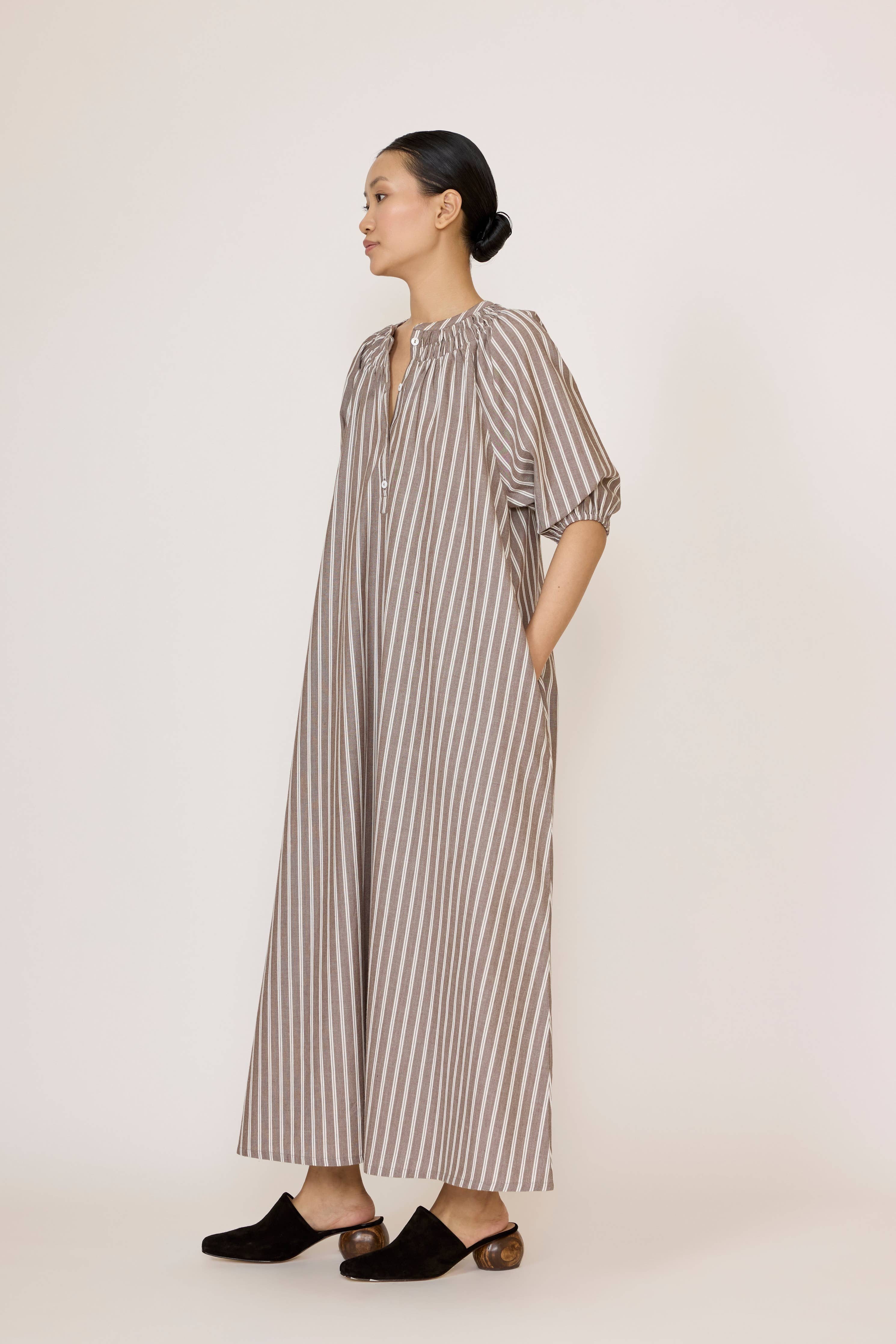 LAUDE popover tunic dress in acorn stripe with relaxed fit, long sleeves, and casual style, shown on a model.