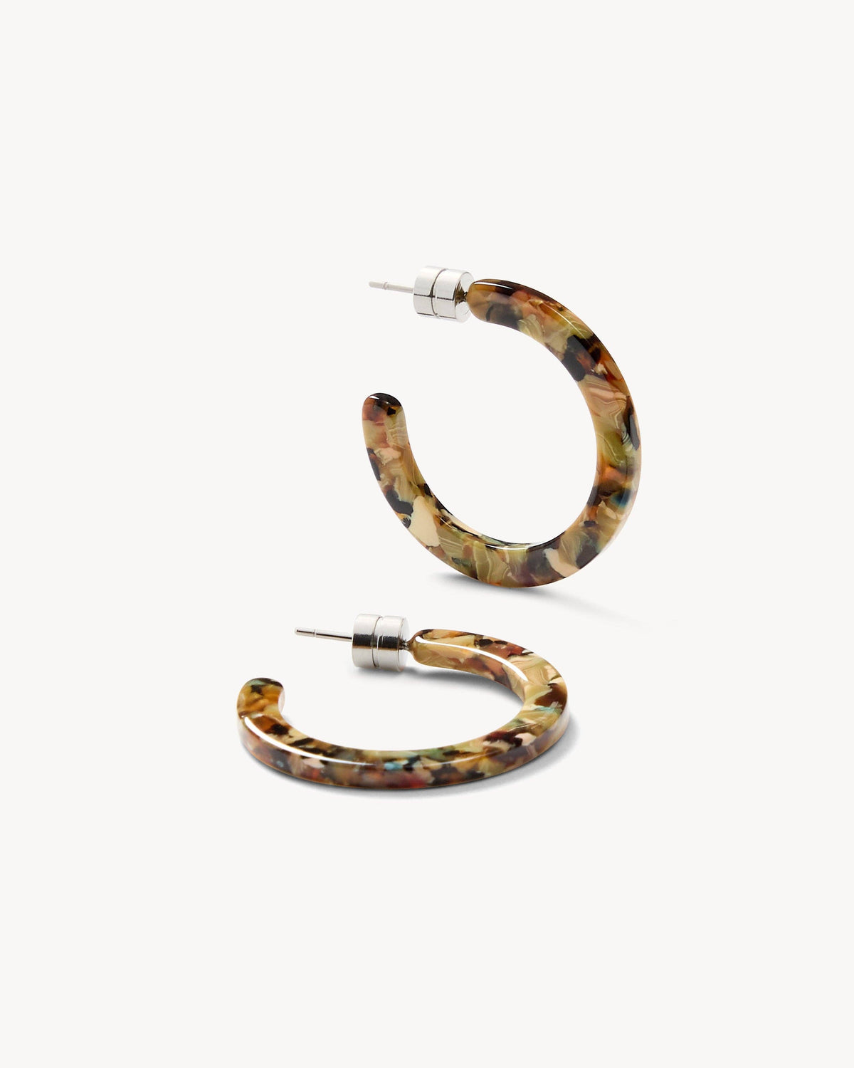 MACHETE Mini Hoops in Monet, gold-tone earrings with delicate hoop design and textured finish, close-up view.