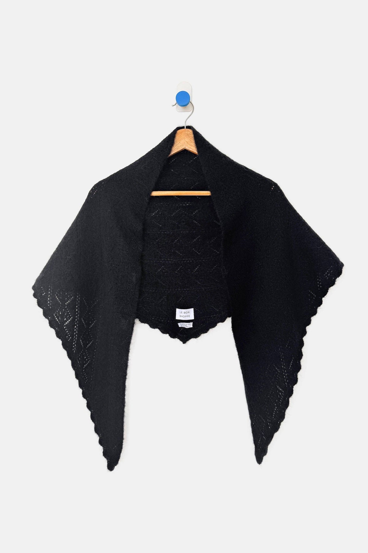 Le Bon Shoppe mohair pointelle shawl in soft, lightweight knit with delicate pattern and fringed edges, ideal for layering.