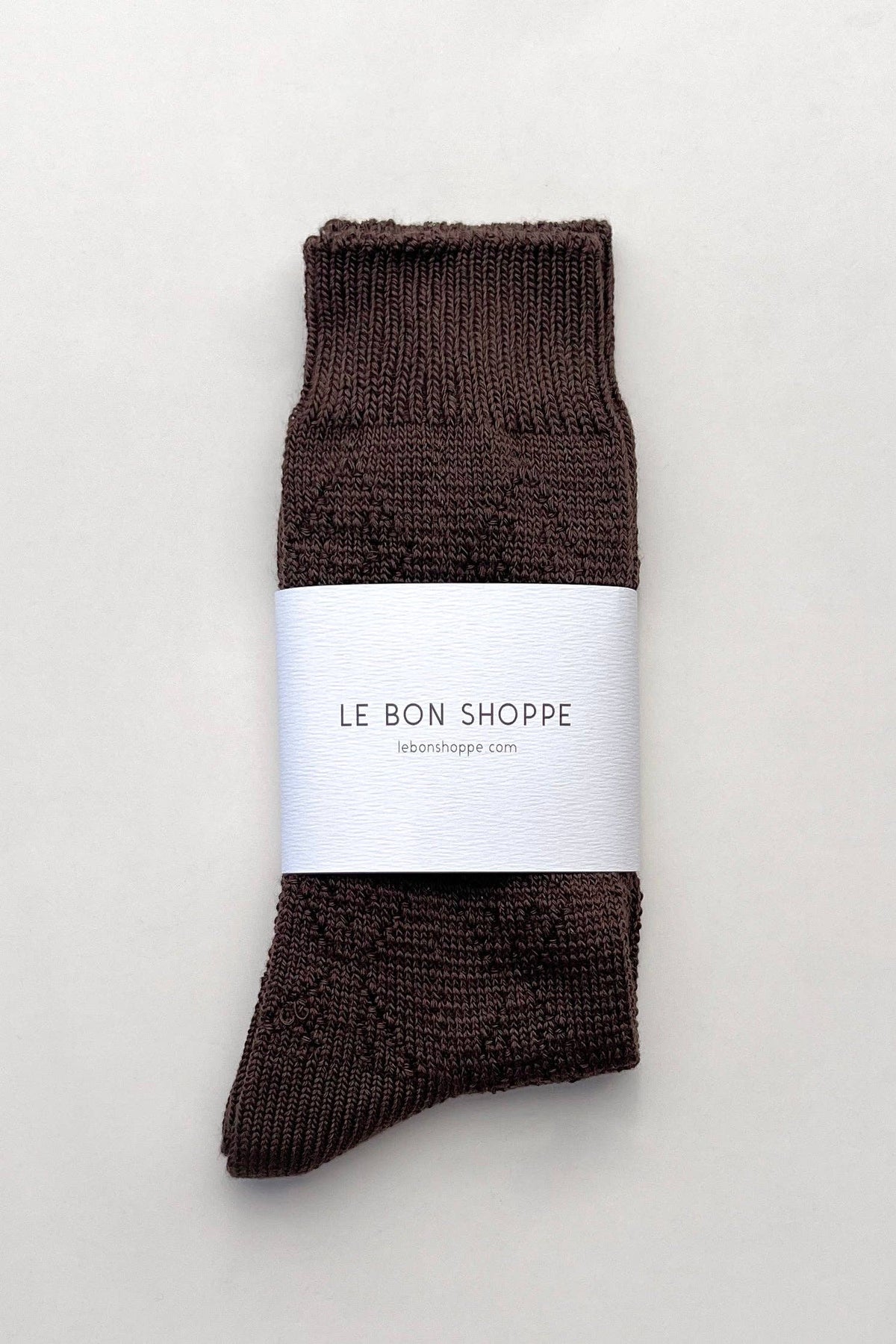 Le Bon Shoppe modal eyelet socks in soft fabric, shown in a close-up view with eyelet details on the cuffs.
