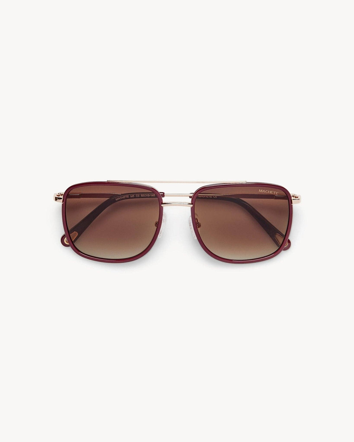 MACHETE Amelia sunglasses in oxblood with rounded frames and dark tinted lenses, stylish eyewear for sun protection.
