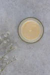 Refillable face cream from The Village Refillery with rosehip and argan oil, shown in a glass jar with a natural skincare appearance.