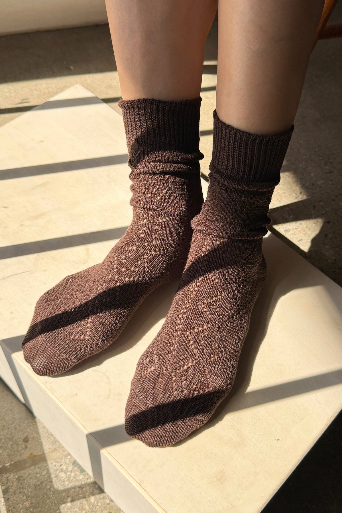 White modal eyelet socks by Le Bon Shoppe featuring delicate eyelet details and a soft, comfortable knit fabric.