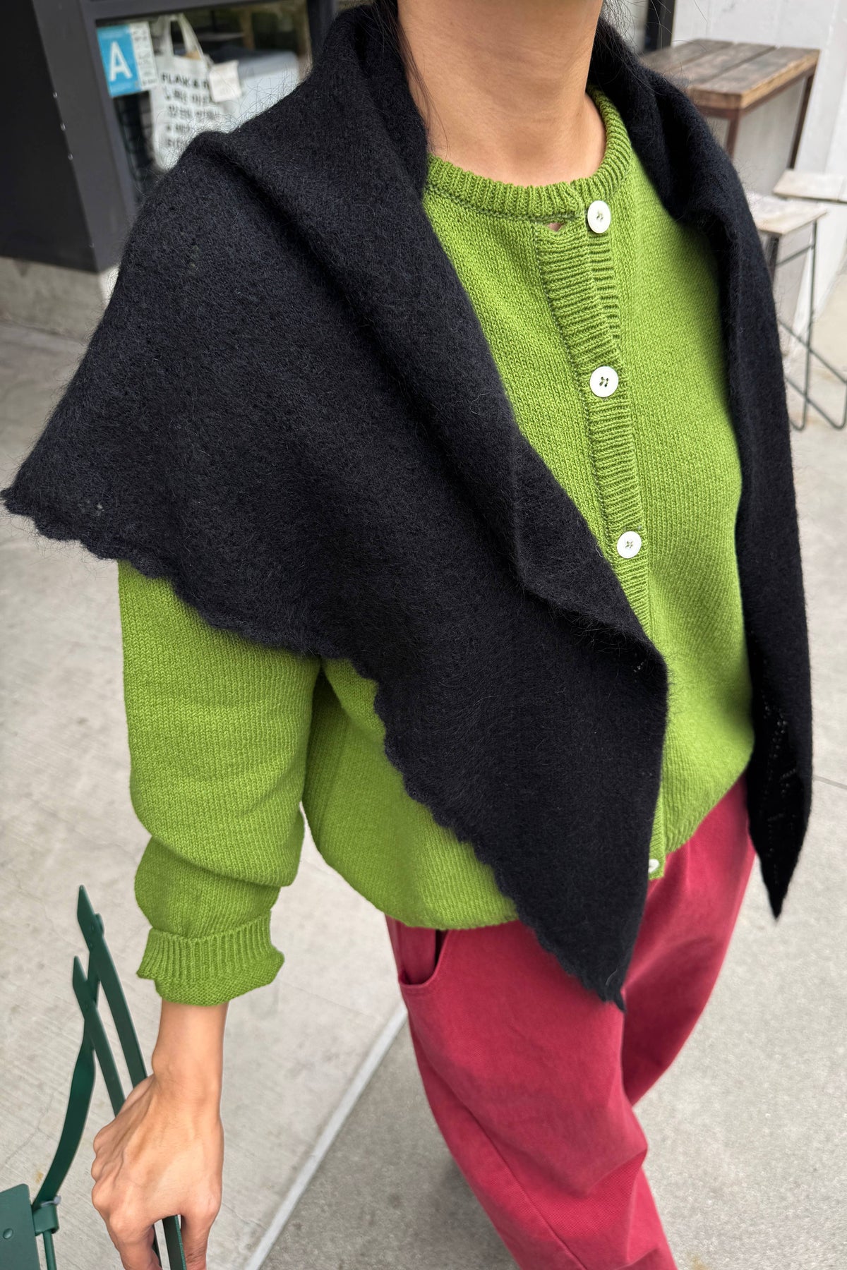 Le Bon Shoppe mohair pointelle shawl with delicate knit pattern, soft texture, and lightweight design, shown draped in natural light.