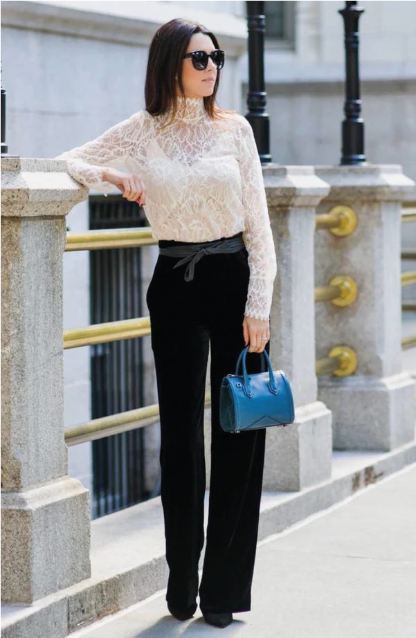 Black leather midi wrap belt from ADA Collection Belts, featuring a sleek design and adjustable fit for stylish accessories.