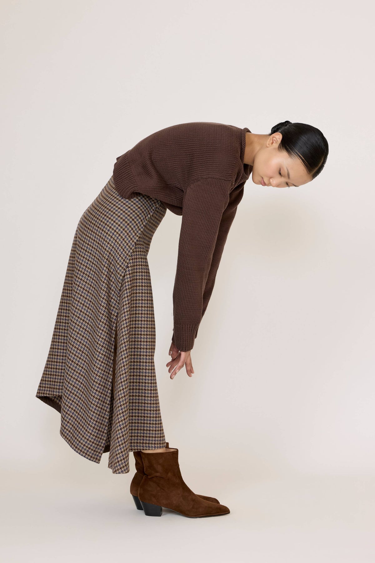 LAUDE wool plaid flowy midi skirt with a soft, layered design and classic plaid pattern, perfect for stylish fall outfits.
