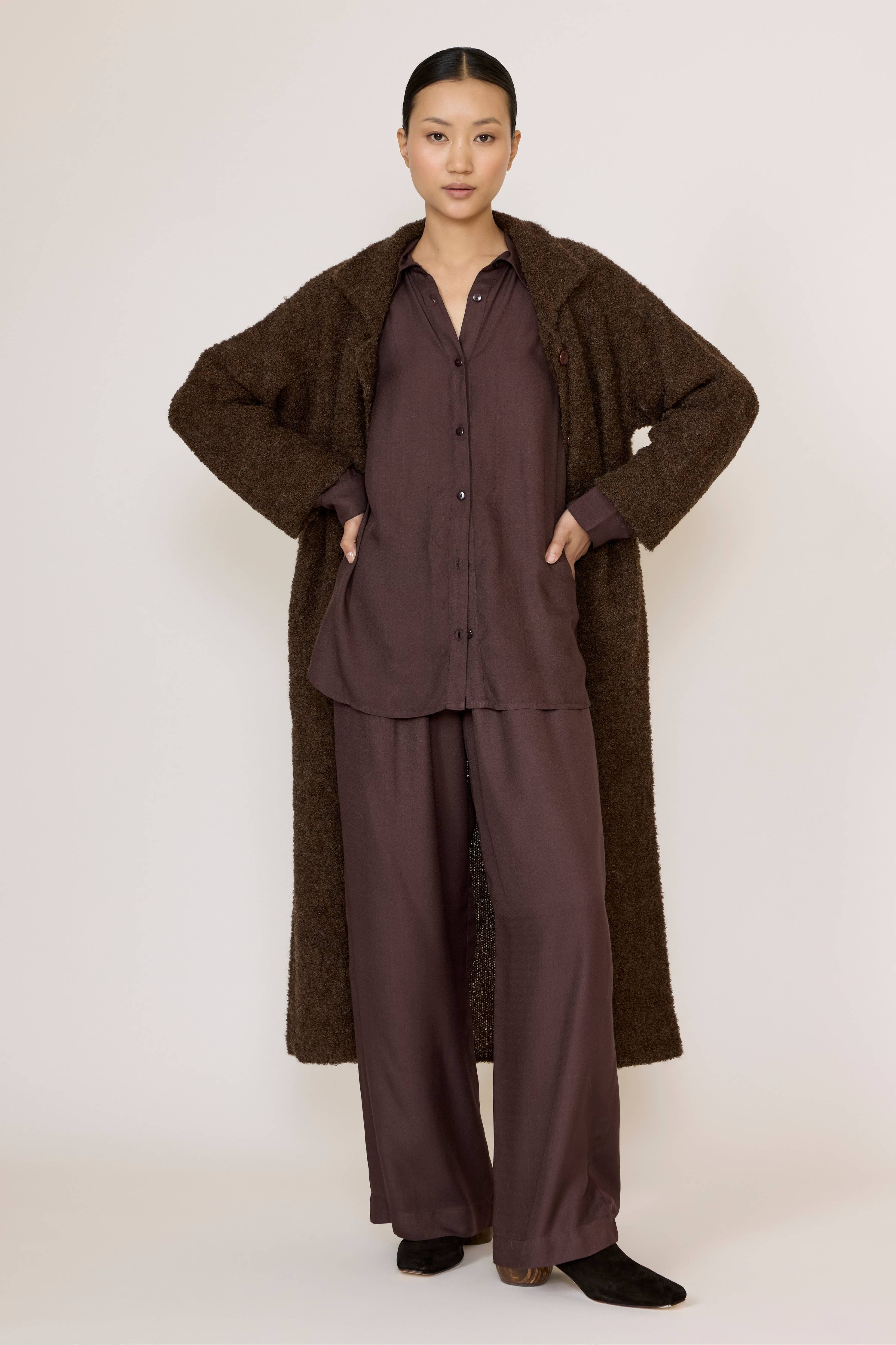 LAUDE Everything Shirt in chocolate brown, casual long-sleeve shirt with a relaxed fit, displayed on a hanger.