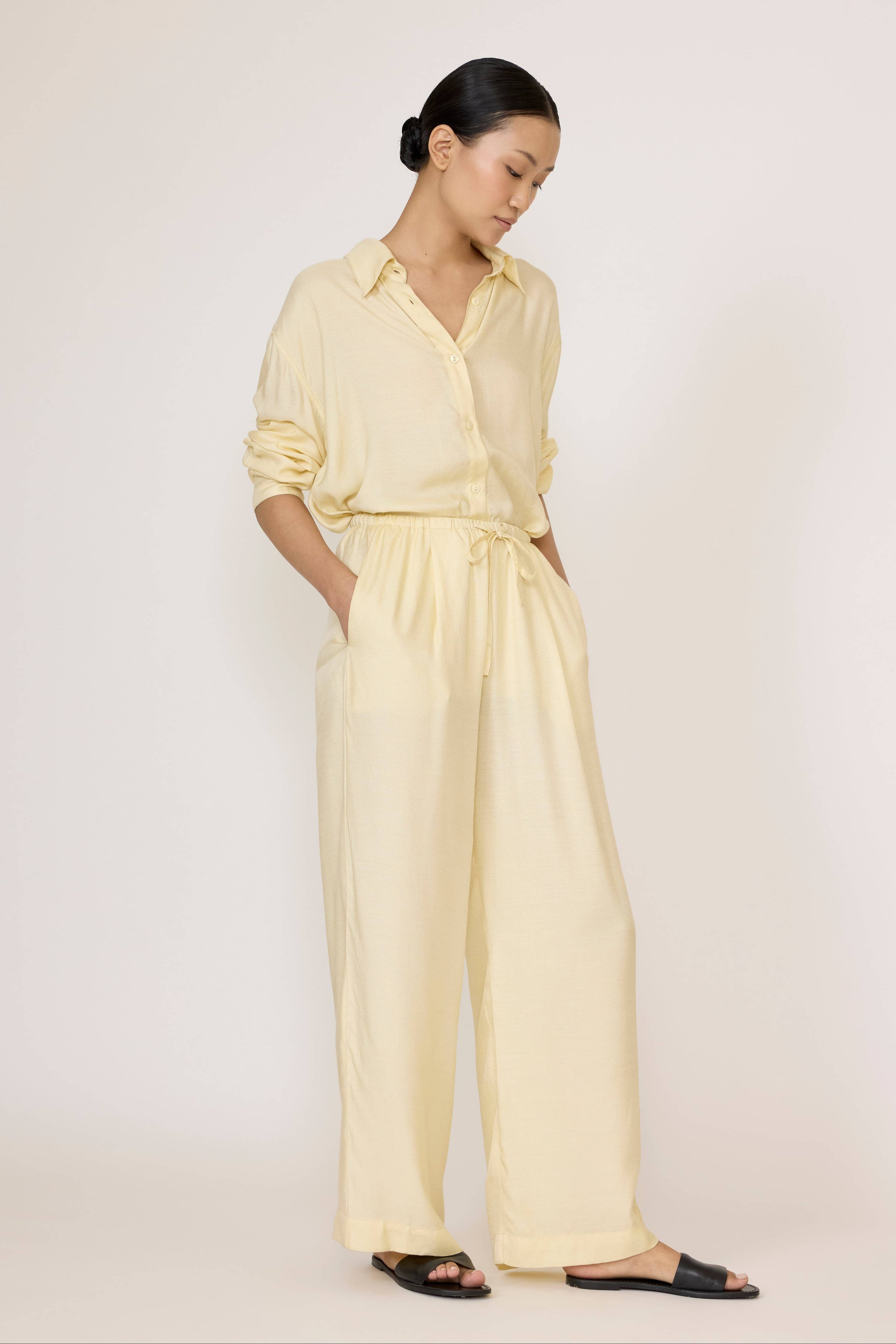 LAUDE Easy Pant in Butter color, featuring a relaxed fit with soft fabric and comfortable waistband, shown on a model.