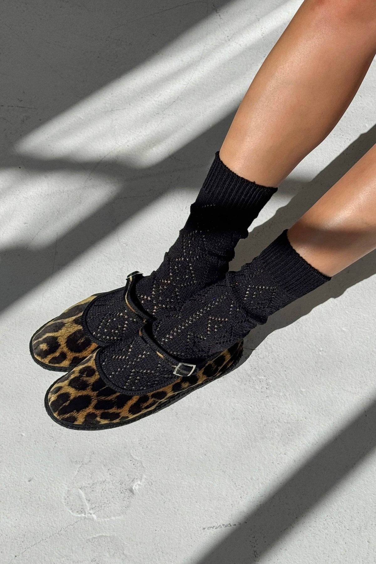 White modal eyelet socks by Le Bon Shoppe featuring delicate eyelet detailing and soft, breathable fabric.