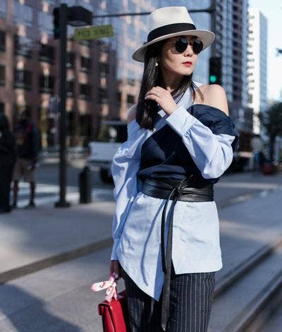 Black adjustable wrap belt from ADA Collection Belts, featuring a stylish design and versatile fit for fashion-forward outfits.
