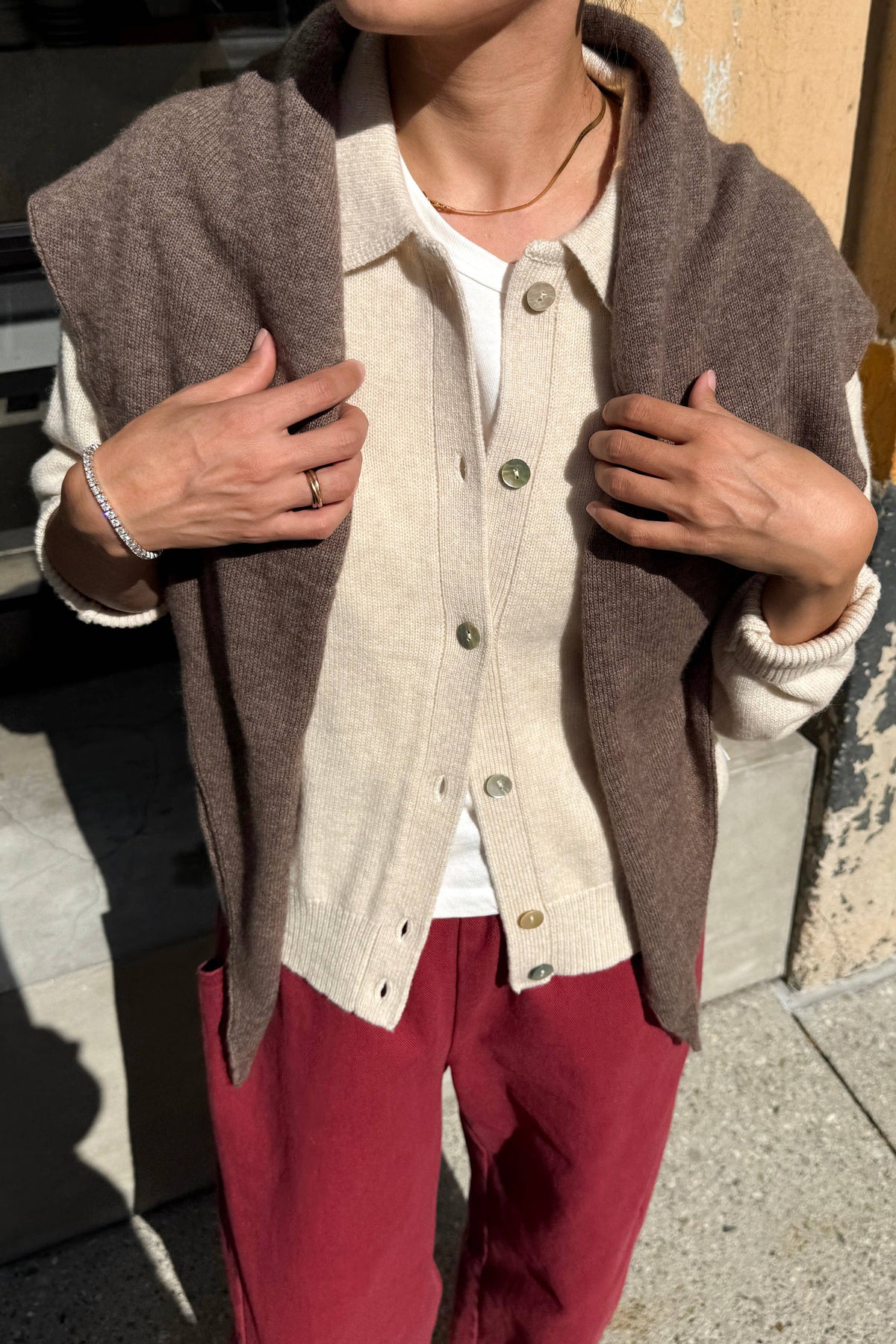 Soft beige cashmere shawl by Le Bon Shoppe, draped to showcase its luxurious, cozy fabric and elegant natural design.