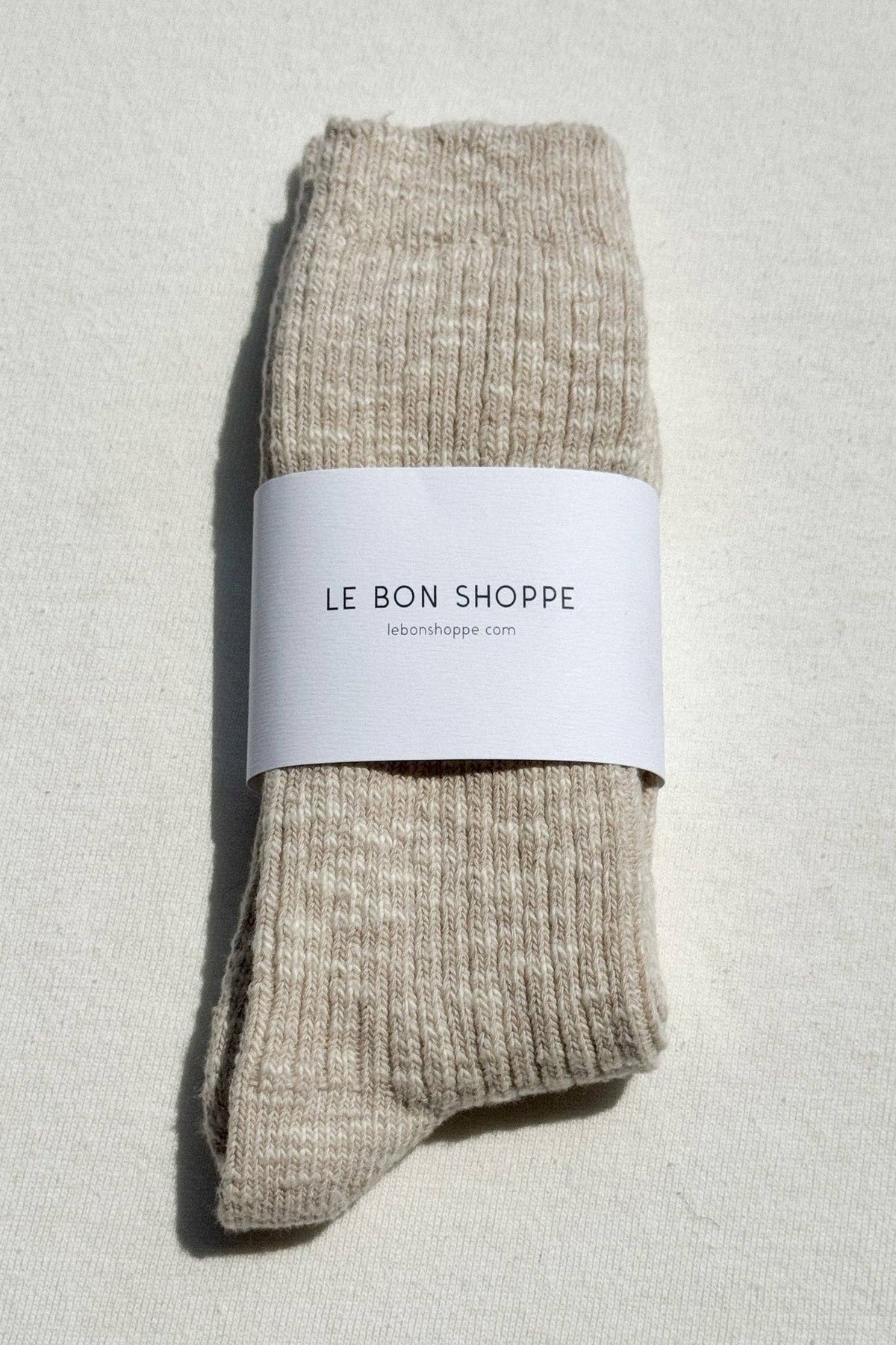 Le Bon Shoppe Cottage Socks in cozy knit, featuring a soft pastel color and ribbed cuff, perfect for comfortable wear.