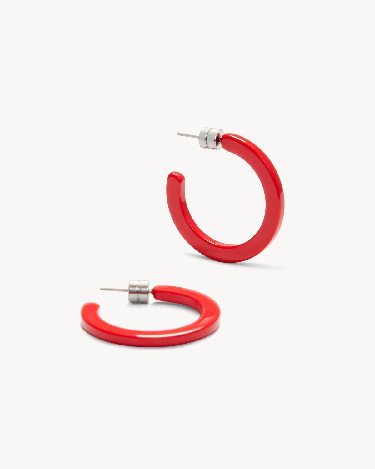 MACHETE mini ruby hoop earrings featuring small, shiny red gemstone hoops on a delicate gold setting