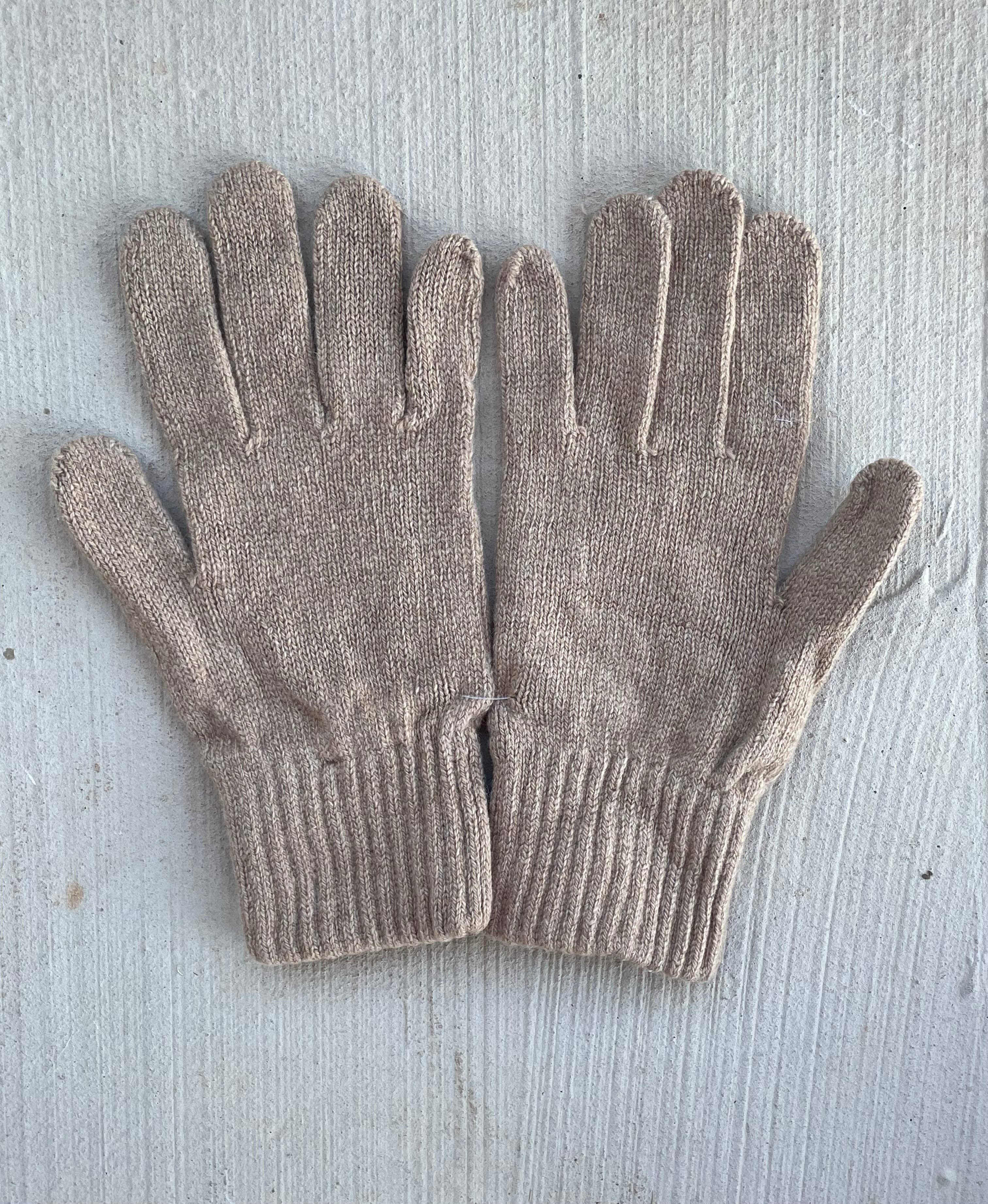 Camel-colored Bedford recycled cashmere gloves by and for Good, soft and cozy, shown on a model's hands.