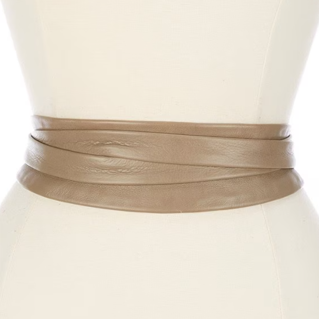 Leather wrap belt in mushroom color from ADA Collection Belts, showing the textured leather strap and buckle detail.
