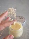 Refillable face cream with rosehip and argan oil from The Village Refillery, featuring a jar of nourishing body care face moisturizer.